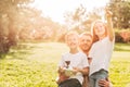 happy father with cute little kids playing with drone together