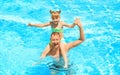 Happy father with daughter resting in swimming pool Royalty Free Stock Photo