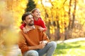 Happy father and daughter spending time. Autumn walk Royalty Free Stock Photo