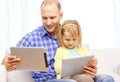 Happy father and daughter with tablet pc computer Royalty Free Stock Photo