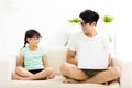 Happy father and daughter using laptop Royalty Free Stock Photo