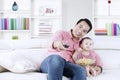 Happy father and daughter watching TV Royalty Free Stock Photo