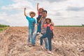 Happy father and daughters and son in organic farm in Thailand