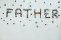Happy father day board with written from eye evil beads on the white background