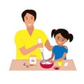 Happy father and doughter cutting cookies together