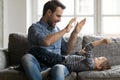 Happy father giving high five to cute preschooler son Royalty Free Stock Photo