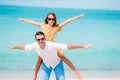 Happy father and his adorable little daughter at tropical beach having fun Royalty Free Stock Photo