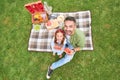 Happy father and his lovely little daughter smiling at camera, eating watermelon while having a picnic in the park Royalty Free Stock Photo