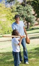 Happy father and his son playing baseball Royalty Free Stock Photo