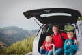 Happy father with kids travel by car in nature Royalty Free Stock Photo