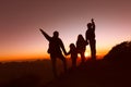 Happy father with kids travel in sunset mountains Royalty Free Stock Photo