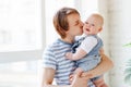 Happy father kisses his baby Royalty Free Stock Photo