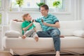 Happy father and little boy eating ice-cream Royalty Free Stock Photo