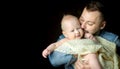 A happy father lives on the hands of a newborn baby Royalty Free Stock Photo