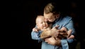 happy father lives in the arms of a newborn baby Royalty Free Stock Photo