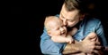 happy father lives in the arms of a newborn baby Royalty Free Stock Photo