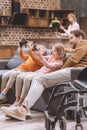 happy father looking how children playing Royalty Free Stock Photo