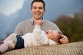 Happy father with a playful daughter