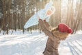 Happy father playing with little child son boy in winter nature Royalty Free Stock Photo