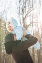 Happy father playing with little child son boy in winter nature Royalty Free Stock Photo