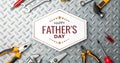 Happy Father s Day card with a spanner isolated on a metal background Royalty Free Stock Photo