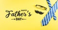 Happy Father`s Day background concept with blue tie, glasses and mustache with the text on pastel yellow background