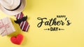 Happy Father`s Day background concept with tie and  mustache, hat, gift box, red heart  with the text on pastel yellow background Royalty Free Stock Photo