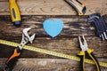 Happy father`s day background concept. Top view of construction handy tools on the wooden background.