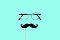 Happy father`s day background. glasses, false mustache on a blue background. vector illustration Royalty Free Stock Photo