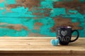 Happy Father`s day concept with coffee mug and gift box over wooden background