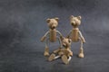 Happy Father`s Day concept. Greeting card with family of wooden toy bears on dark background Royalty Free Stock Photo