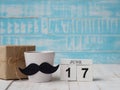 Happy father`s day concept. 17 June wooden block calendar, gift