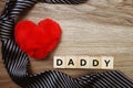 Happy Father`s Day concept with DADDY alphabet letter with space copy on wooden background