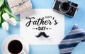 Happy Father`s Day decoration concept with greeting card on pastel blue background