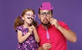 Happy father`s day! funny dad and daughter with mustache fooling Royalty Free Stock Photo