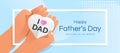 Happy father`s day - son hands holding paper heart with i love dad text in white frame on soft blue background vector design Royalty Free Stock Photo