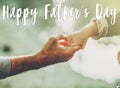 Happy father`s day text, greeting card concept. father and littl