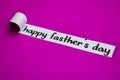 Happy Father`s Day text, Inspiration, Motivation and business concept on purple torn paper