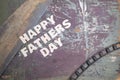 Happy Father\'s Day text, plain wooden letters on a chipped paint background Royalty Free Stock Photo