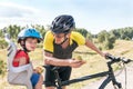 Happy father and son is eating lunch (snack) during bicycle ride Royalty Free Stock Photo