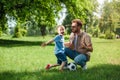 happy father and son with football ball Royalty Free Stock Photo