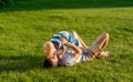 Happy father and son having fun outdoor on meadow Royalty Free Stock Photo