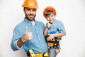 Happy father with son mending flat stock photo