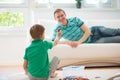Happy father and son playing at home Royalty Free Stock Photo