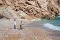 Happy father and son playing together at beach Royalty Free Stock Photo