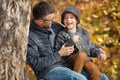 Father and son happy together outdoors on a sunny day