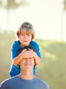 Happy father and son playing on tropical beach, carefree happy f Royalty Free Stock Photo