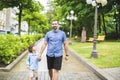 Happy father and son portrait walking together having fun Royalty Free Stock Photo