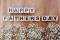 Happy fathers day alphabet letters on wooden background Royalty Free Stock Photo