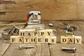 Happy Fathers Day blocks on rustic wood